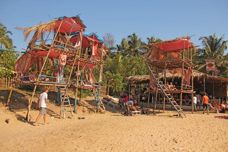 India, GOA, January 24, 2018. Unusual cafe restaurant on the beach in Anjuna, India GOA. A multi-storey cafe restaurant from bamboo on the beach by the sea.のeditorial素材