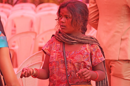 India, GOA, January 28, 2018. Poor child asks money from passers-by, child with outstretched hand, beggar. Poverty in India.のeditorial素材