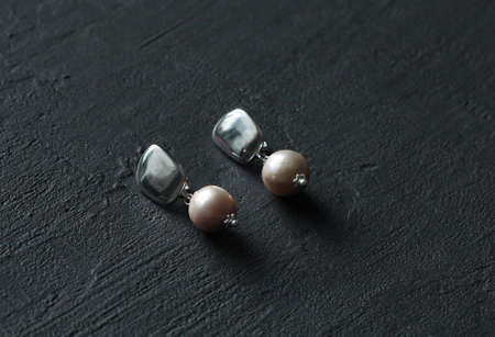 Chrome diopside bracelet. A bracelet made of stones on a hand from natural stone Chrome diopside. Bracelet made of natural stones. Handmade jewelry. Handmade bracelets on light modern background.の写真素材