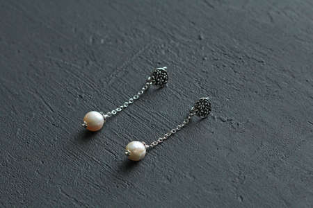 Chrome diopside bracelet. A bracelet made of stones on a hand from natural stone Chrome diopside. Bracelet made of natural stones. Handmade jewelry. Handmade bracelets on light modern background.の写真素材