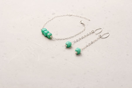 Chrysoprase bracelet earrings. Bracelet earrings made of stones on hand from natural stone Chrysoprase. Bracelet earrings made of natural stones. Handmade jewelry.の写真素材
