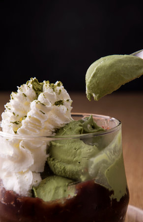 Green tea ice cream with whipped creamの写真素材