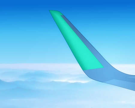 The blue tone of airplane wing. Part of Airplane with cloudy blue sky.の写真素材