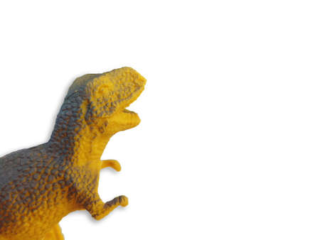 half part of gradient yellow-gray color dinosaur toy isolated on white background with free copy space and clipping path.の写真素材