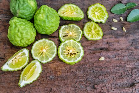 Bergamot on old wooden tables background.の写真素材
