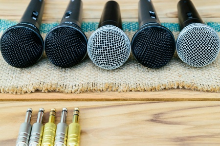 Microphone on wooden tableの素材