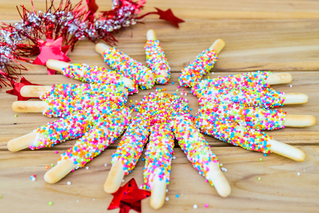 Colorful biscuit stick coated enamel rainbow sugarの写真素材