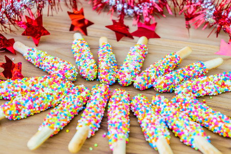 Colorful biscuit stick coated enamel rainbow sugarの写真素材