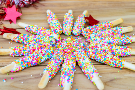 Colorful biscuit stick coated enamel rainbow sugarの写真素材
