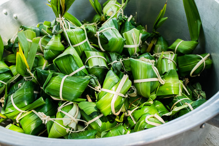 Traditional Thai food style, Thai dessert made from banana and glutinous rice, wrap with pandan (Khao Tom Mat)の写真素材