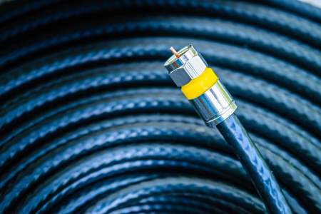 connector f-type with roll of outdoor RG6 signal shielded cableの写真素材