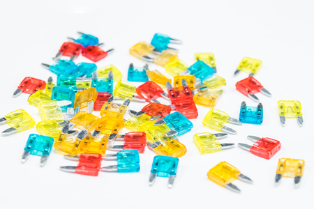 Electrical automotive fuses for car on white backgroundの写真素材