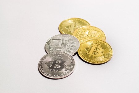 crypto currency golden and white bitcoin isolated on white background.の写真素材