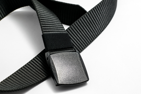 Military tactical belt with semi-automatic buckle for connection. Isolated on white backgroundの写真素材