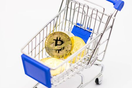 Bitcoin in mini Shopping Cart Isolated on White Background