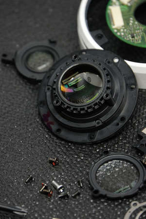 Camera lens reparation with screwdrivers, repair conceptの写真素材