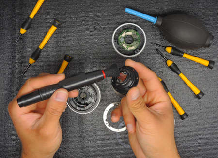 Lens cleaning and repair, camera repair conceptの写真素材