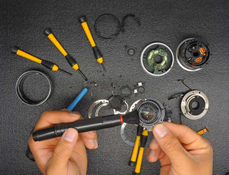 Camera repair, lens cleaning and repair conceptの写真素材