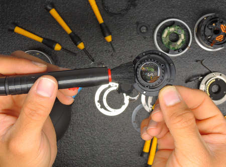 Camera repair, lens cleaning and repair conceptの写真素材