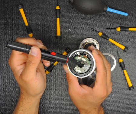 Camera repair, lens cleaning and repair conceptの写真素材