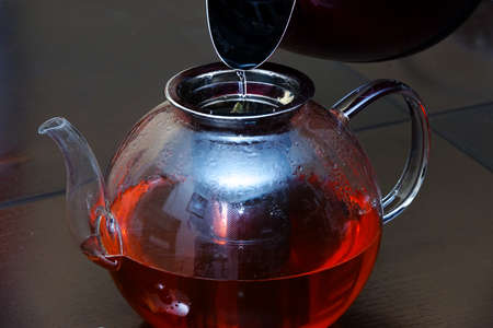glass teapot to prepare herbal tea, tea conceptの写真素材