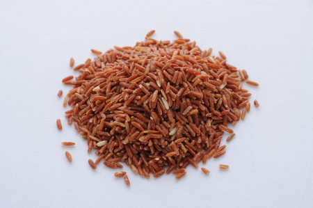 Heap of jasmine rice on a white background.の写真素材