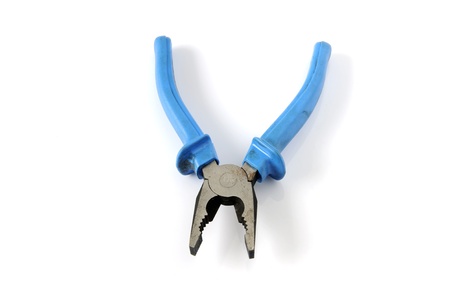 Dirty pliers on a white background.