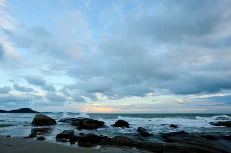 Sunset over coastal rocksの写真素材