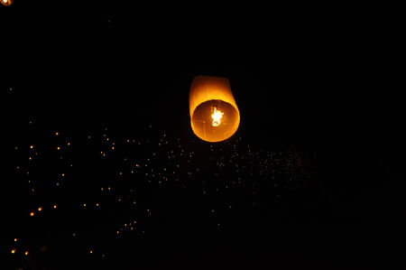 Lanterns floating on the sky in Loi Krathong Traditional Festivalの写真素材