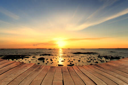 Empty wooden bridge and cloud sky backgroundの写真素材
