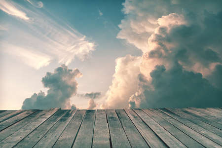Empty wooden bridge and cloud sky background in vintage styleの写真素材