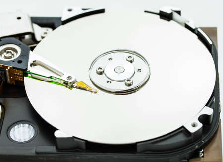 A close up macro of an opened computer harddrive 