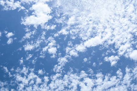 The sky is blue with white clouds.