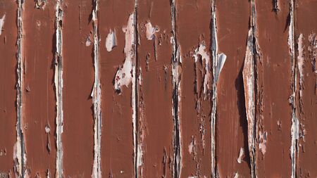 The old brown lath wall that has faded from the sun for a long time.の写真素材