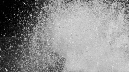 The picture of a drop of fountain that explodes violentlyの写真素材