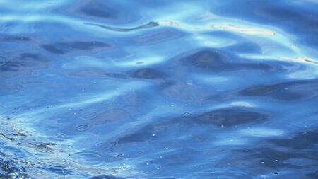 Water waves that hit the coastの写真素材