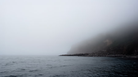 The sea hills and sand are covered with fog and spray scary mystery ocean and mountains Tourist attraction 3d illustrationの写真素材