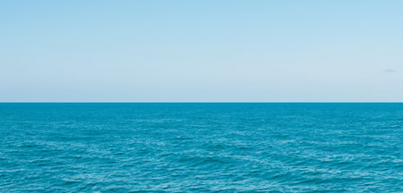 sea and horizon image of sea waves and sky Calm sea waves on a clear dayの写真素材