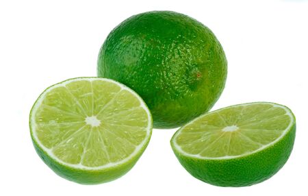 Fresh limes isolated on white
