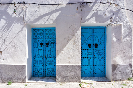 Traditional blue door in the medina of Tunis, Tunisiaの写真素材
