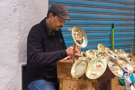TUNIS, TUNISIA -APRIL 3: Goldsmith working on the street in the medina in Tunis, Tunisia on April 3, 2018.のeditorial素材