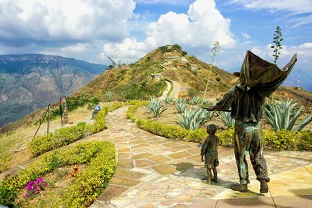 SANTANDER, COLOMBIA -JANUARY 19: Two Sculptures accompany the view of the top of the Chicamocha National Park in Santander, Colombia on January 16, 2019のeditorial素材