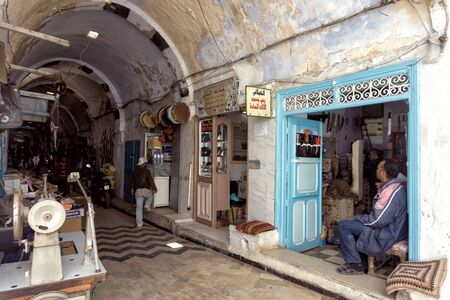 KAIROUAN, TUNISIA - APRIL 9:Men in the traditional market in the medina in Kairouan, Tunisia on April 9, 2018.のeditorial素材