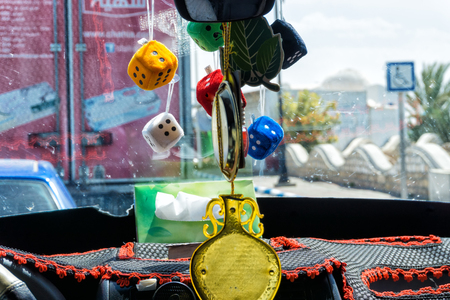 Colorful decoration in front of a taxi in Houmt Souk, Tunisiaの写真素材