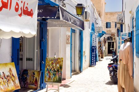 DJERBA, TUNISIA- APRIL 16: View of traditional shops in the medina market in Houmt El Souk in Djerba, Tunisia on April 16, 2018のeditorial素材