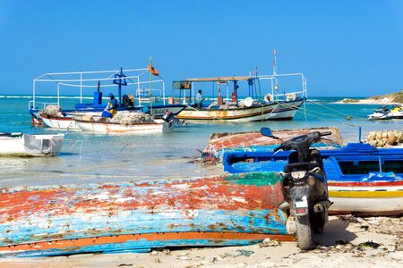 HOUMT SOUK, TUNISIA - APRIL 16:  Fishermen work on the shore of the Mediterranean sea in Djerba, Tunisia on April 16, 2018のeditorial素材