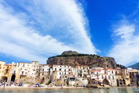 CEFALU, ITALY - MAY 1:Landscape of La Rocca Hill in beach in Cefalu in Sicily, Italy on May 1, 2018のeditorial素材