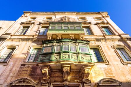 Golden light on the buildings in Valletta, Maltaの写真素材
