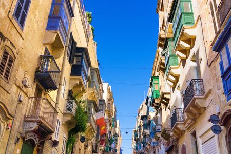 VALLETTA, MALTA - MAY 4 :Colorful old buildings on a street in Valletta, Malta on May 4, 2018のeditorial素材