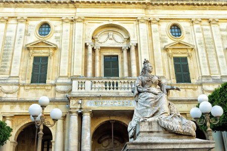 Facade of National Library  with sculpture of the Queen Victoria in Valletta, Maltaのeditorial素材